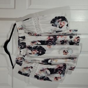 Jennifer Lopez off shoulders silk blouse